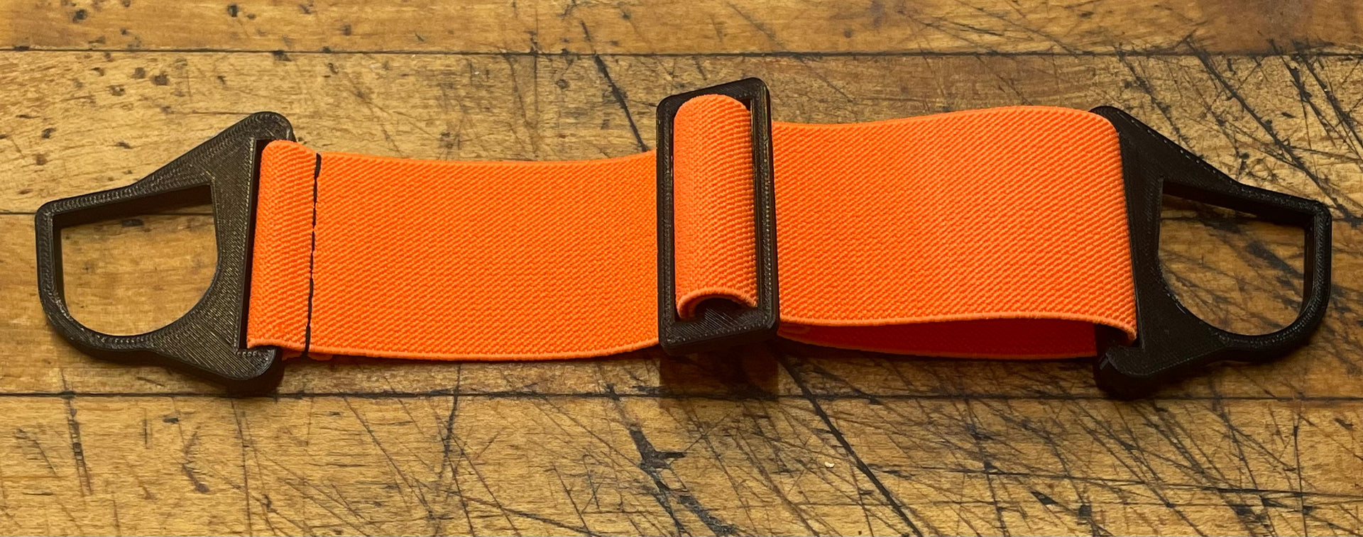 G Strap Designs - Welding Hood Replacement Strap - Go Pokes Colorway with Orange Strap Gloss Black Hardware 
