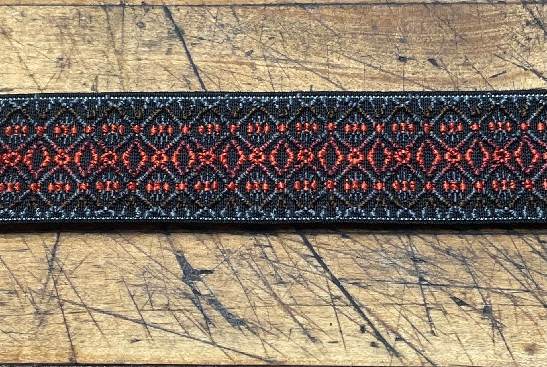 G Strap Designs - Welding Hood Replacement Strap Color Black and Orange Pattern